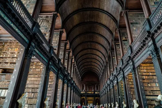 Interior view of Trinity College Library in Dublin, a peaceful and historic stop for senior tourists in Ireland