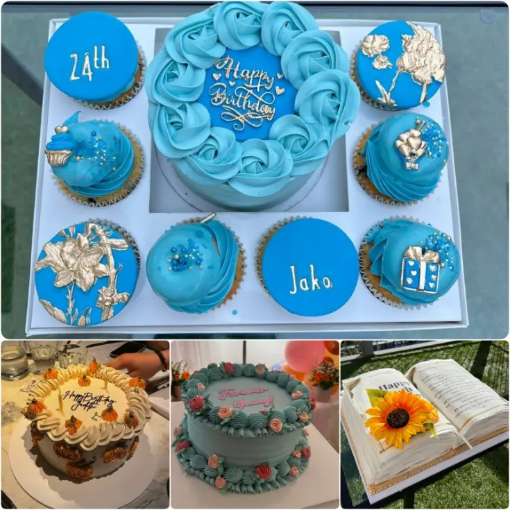 A boxed set of blue birthday cake and cupcakes from Cake Me Away, featuring gold decorations, floral details, and personalized toppers.