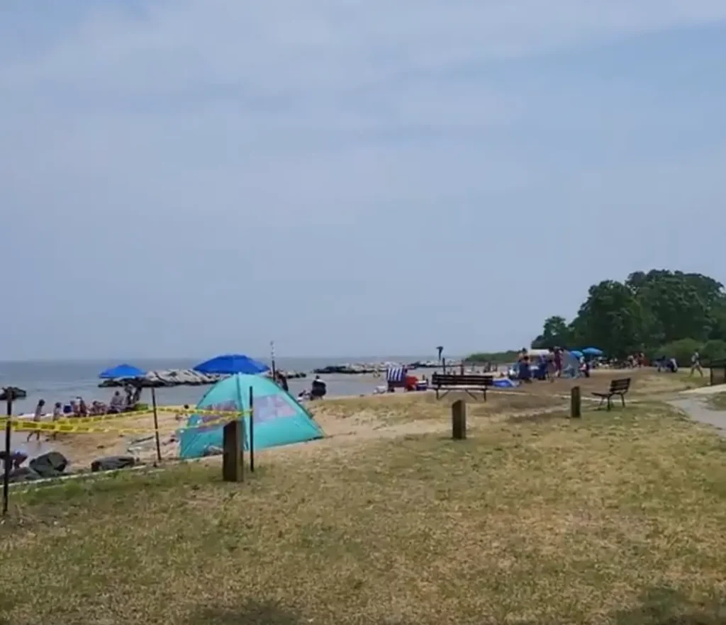 People are relaxing in small tents.